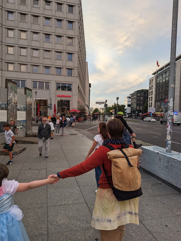Two persons in a city centre in Berlin.