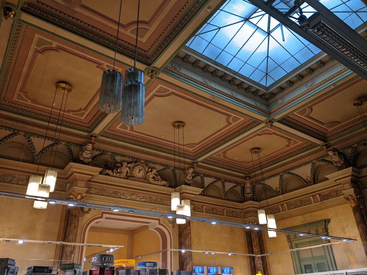 An old trainstation with beautiful architecture.